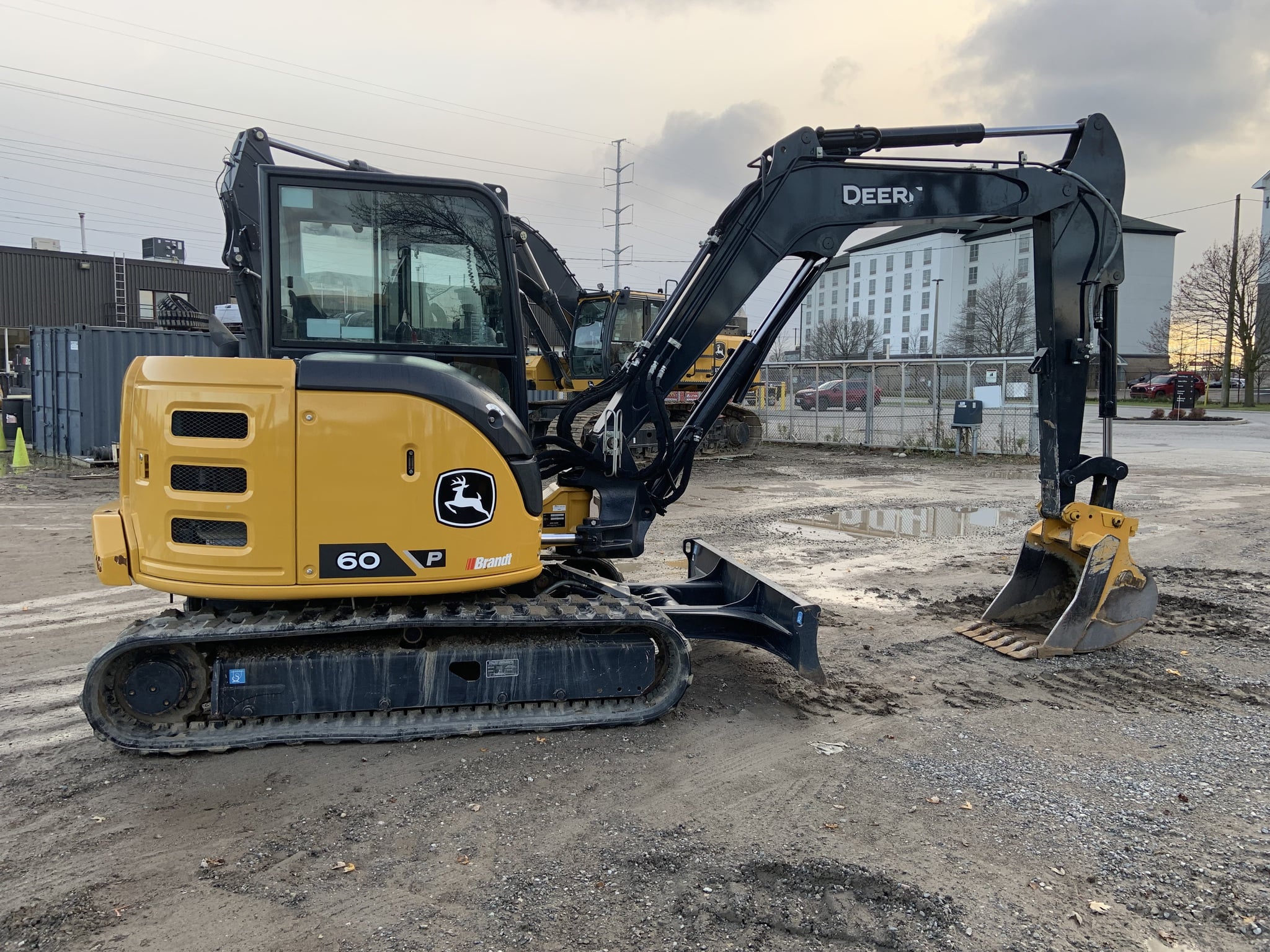 Mini excavator for sale in Canada - John Deere 60P on a job site