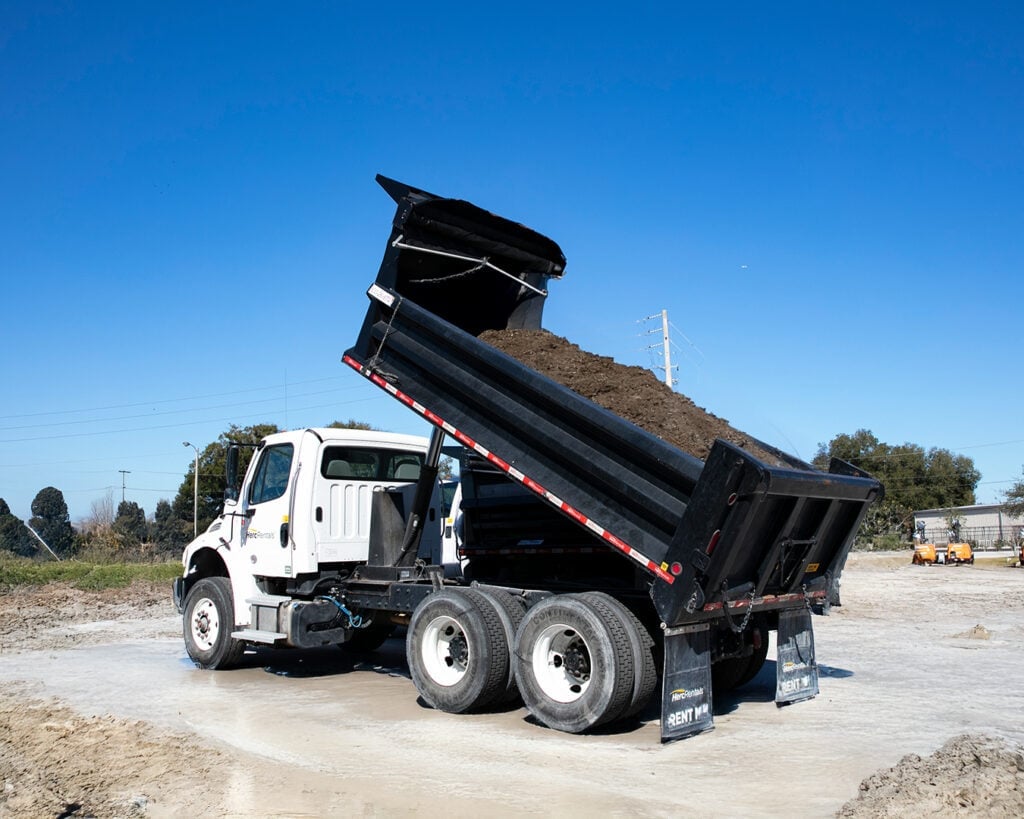Gravel truck dump box raised during unloading