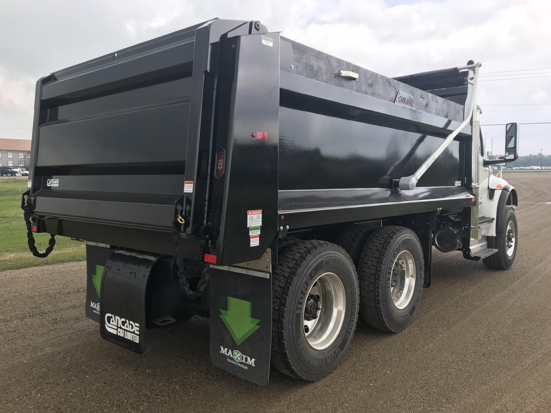 Tandem axle configurations are the most common starting point for general aggregate hauling.
