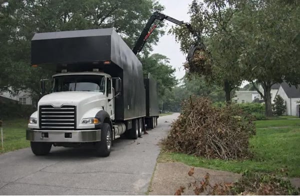 The Hidden Cost of Hauling: How On-Site Air Curtain Burners Reduce Transport Emissions