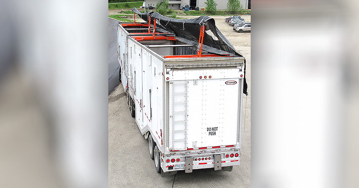 Wood Fibre Hauling Safety Group Incorporating Auto-Tarping Solutions To Reduce Injuries
